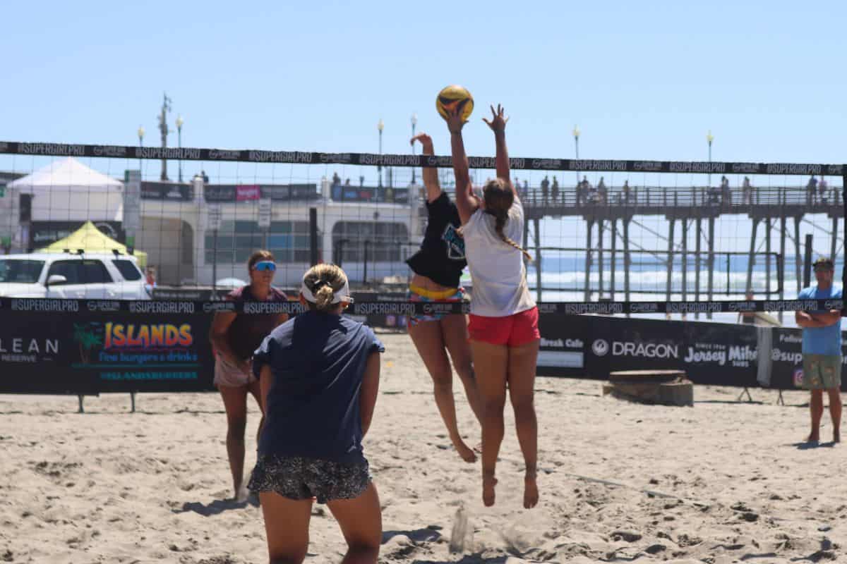 WOMEN HIT THE BEACH FOR HIGH-ENERGY COMPETITIONS IN VOLLEYBALL, FLAG FOOTBALL, AND SOCCER